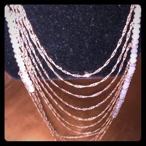 Layered chain gold in color